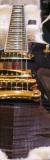 		Gibson - Les Paul Supreme Gaucher Trans. Black
		