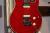 		Musicman - Axis Super Sport HH Manche Pallissandre  Translucent Red RW
		