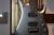 		Musicman - John Petrucci JP13  7 BFR Platinum Silver
		