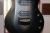 		Musicman - John Petrucci Majesty 7 Polar Noir
		