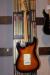 		Fender - Artist Signature - Bonnie Raitt  1995 Sunburst 2 tons
		
