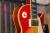 		Gibson - Les Paul Custom 1976 Sunburst
		