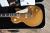 		Gibson - Les Paul DELUXE   GOLD TOP anne  2015 
		
