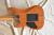 		Washburn - USA MG 100  ann�e 1994 
		